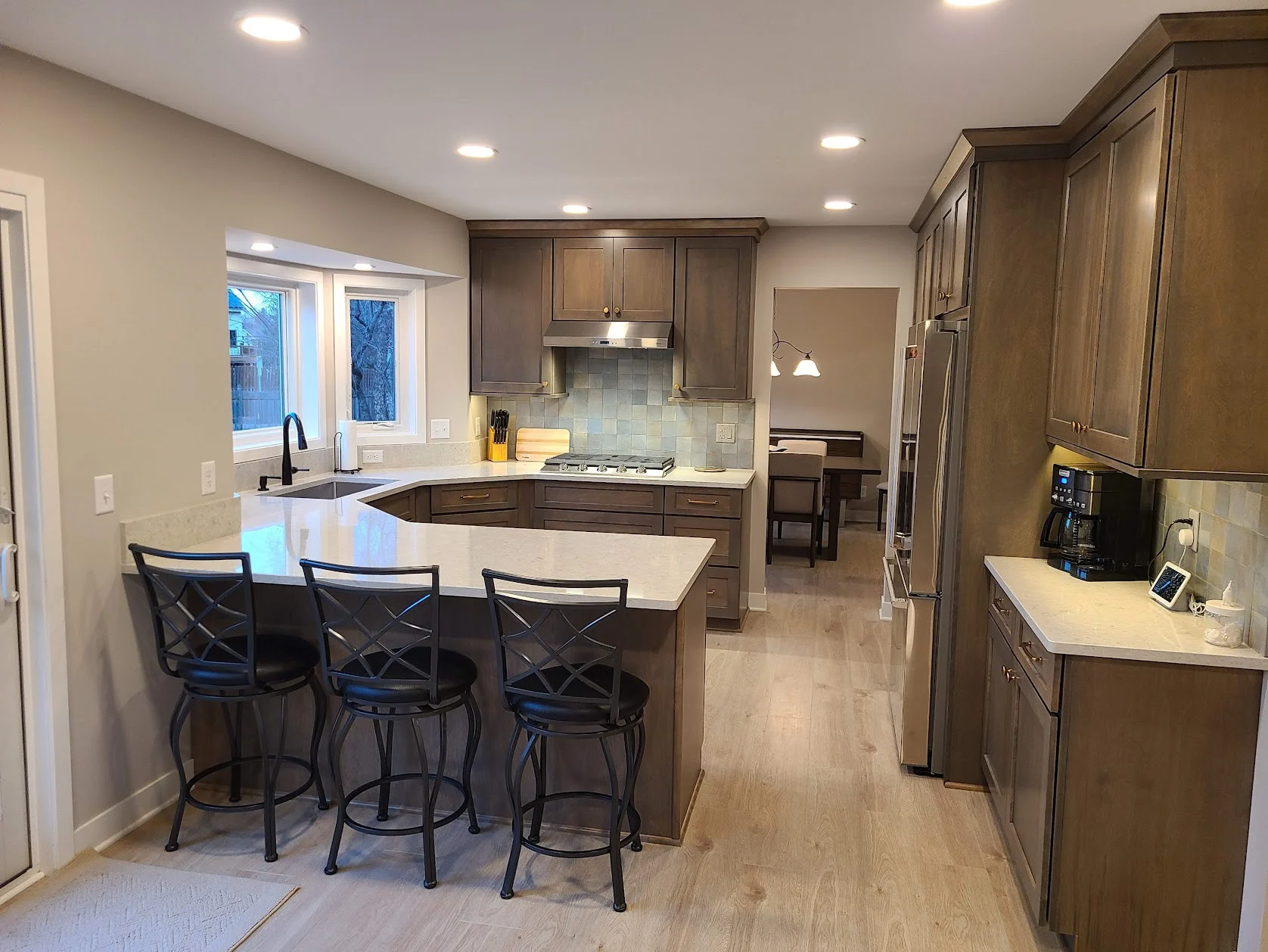 Brightened main-level living space with light walls and open sightlines.
