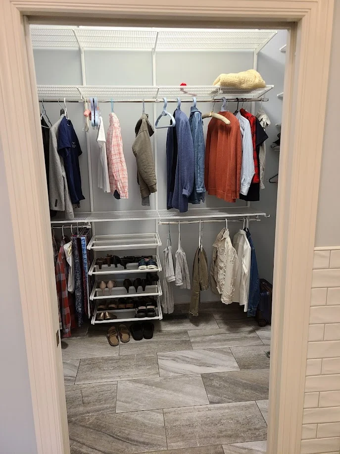 The organized closet, planned with the bathroom.